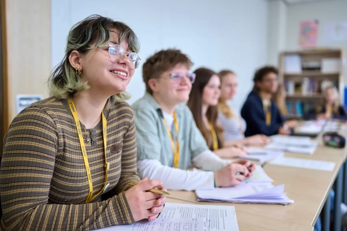 Students class listening tutor studying learning