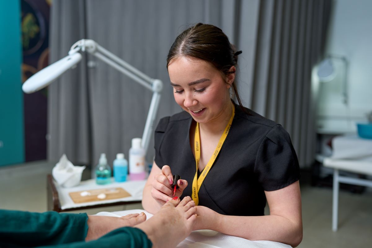 A Beauty student performs a pedicure - Vocational & T Level