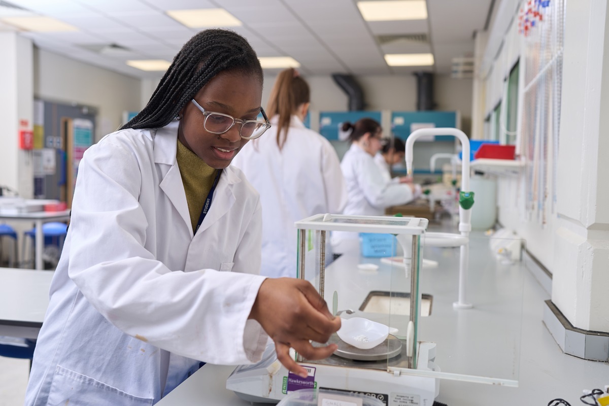 A student performs an experiement Courses for Adults