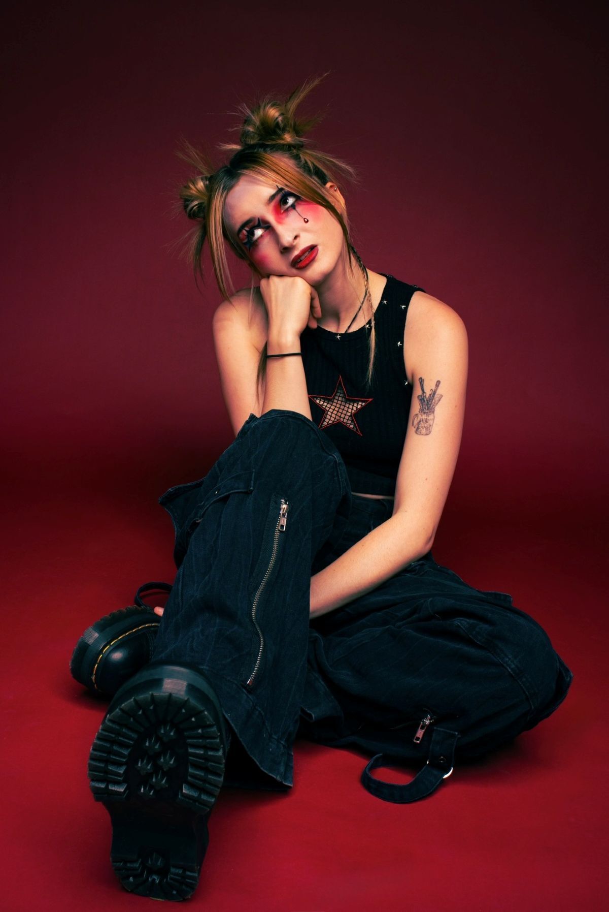 A young woman with punk style make up