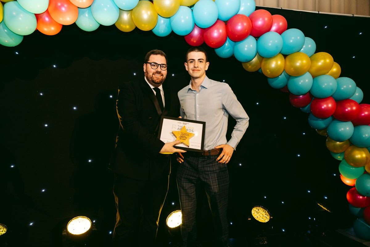 Alfie Malloy is presented with the REACH Apprentice of the Year award by York College University Centre Principal Chief Executive Ken Merry