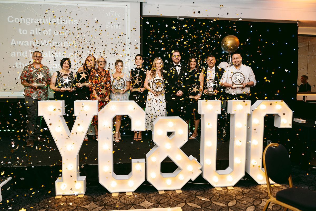 Brilliance Awards 2026 winners group photo with confetti