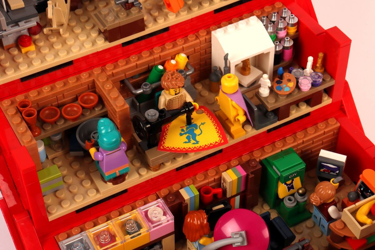 Close up shot inside Lego toolbox of pottery sewing and art workshop