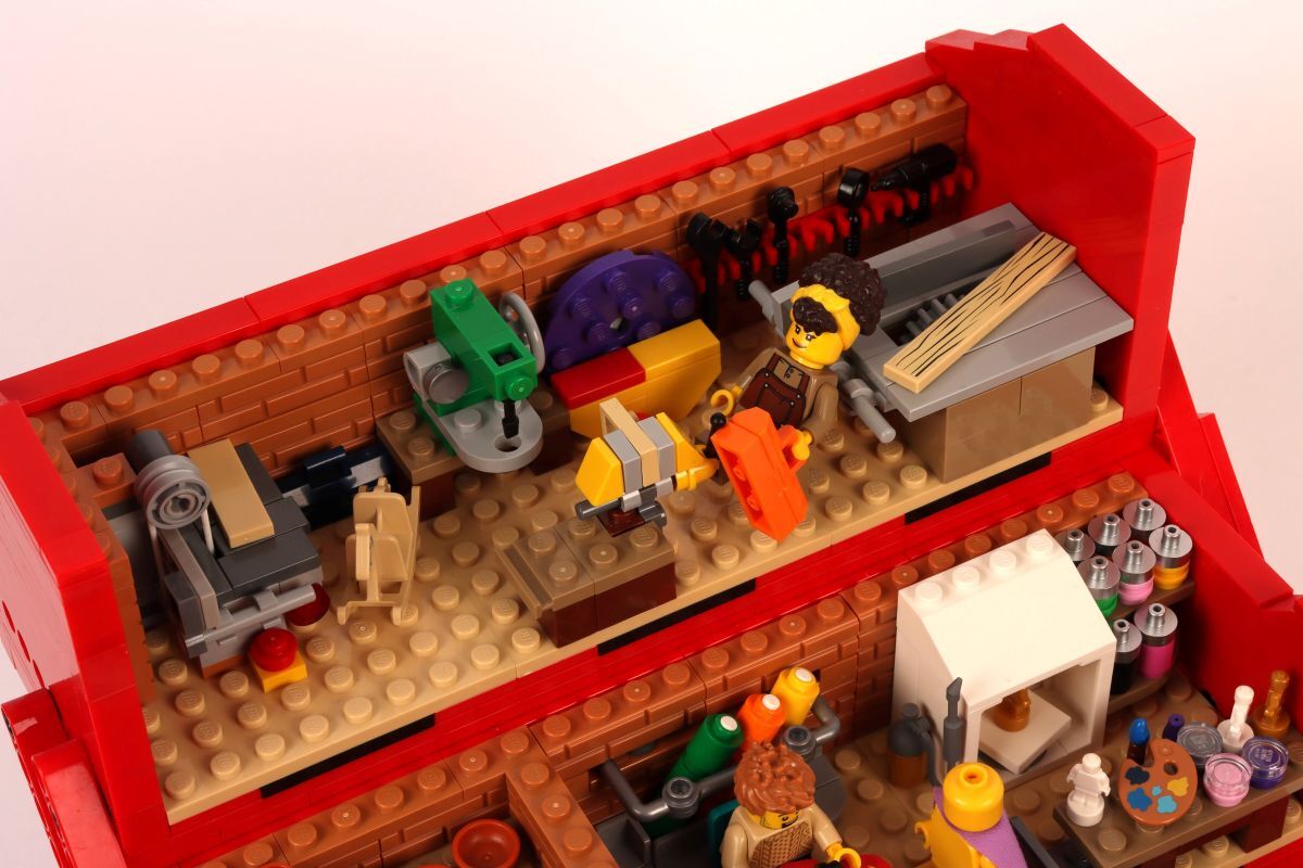 Close up shot inside Lego toolbox of table saw workshop