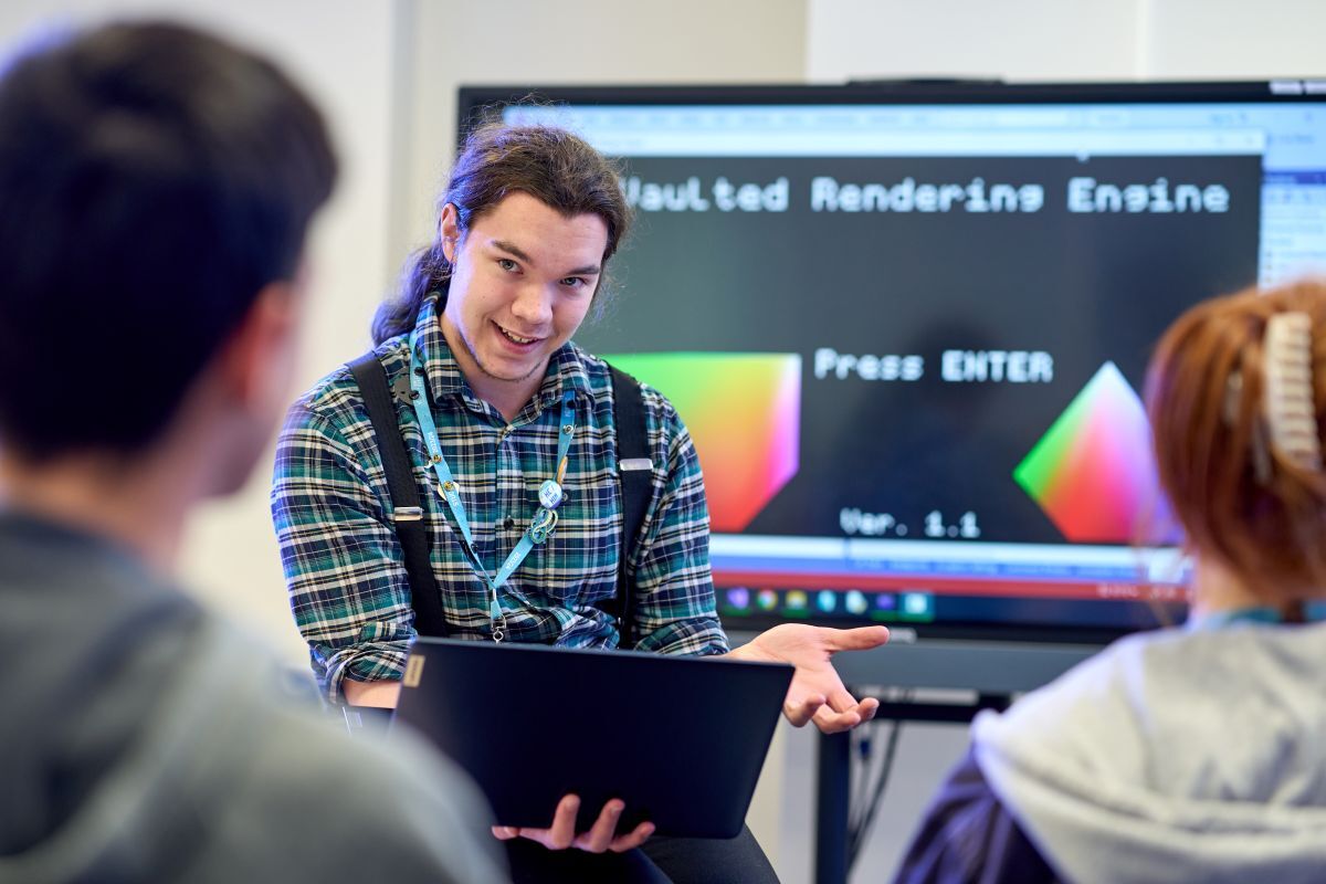 Engineering student presenting to other students