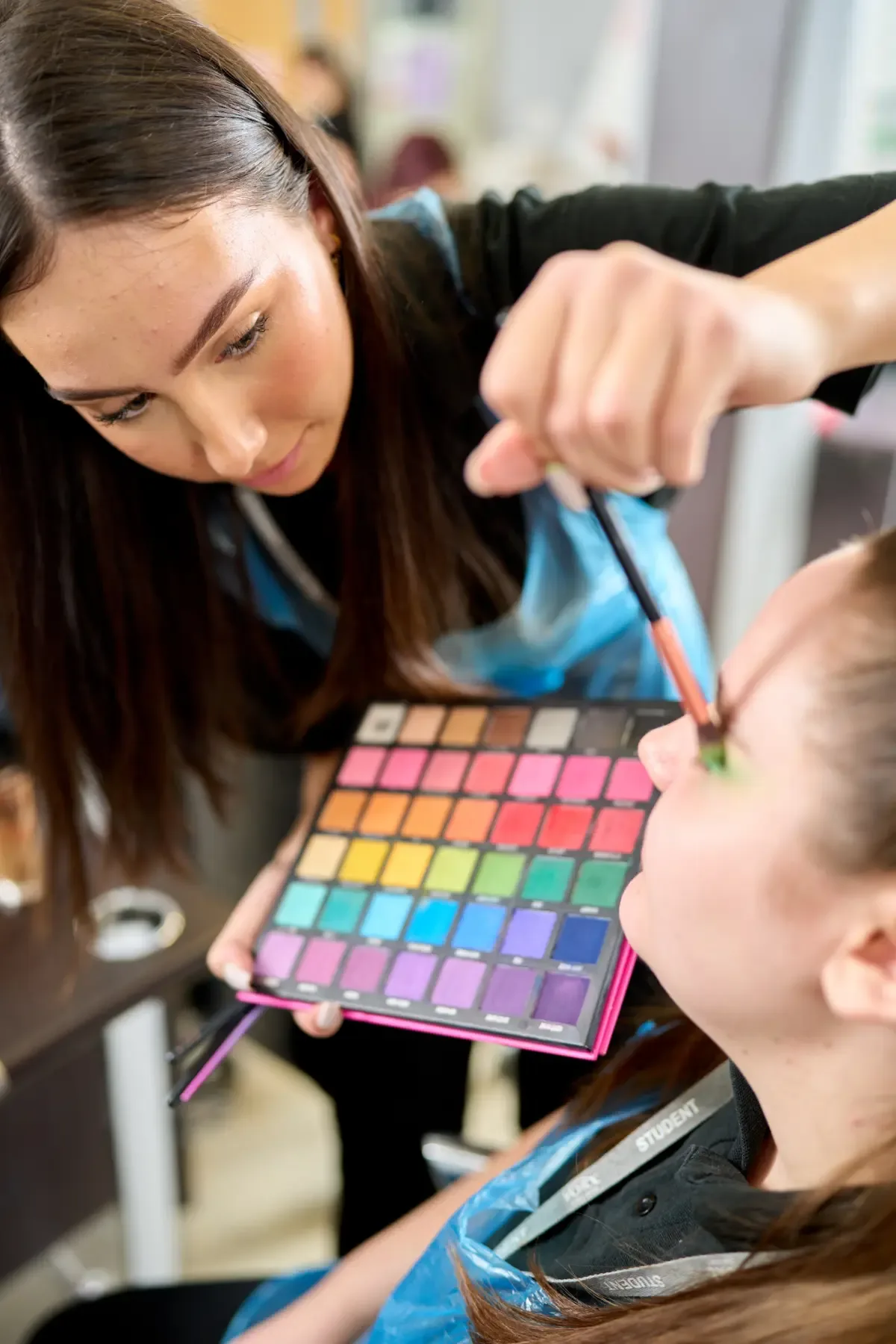 Girl applying makeup