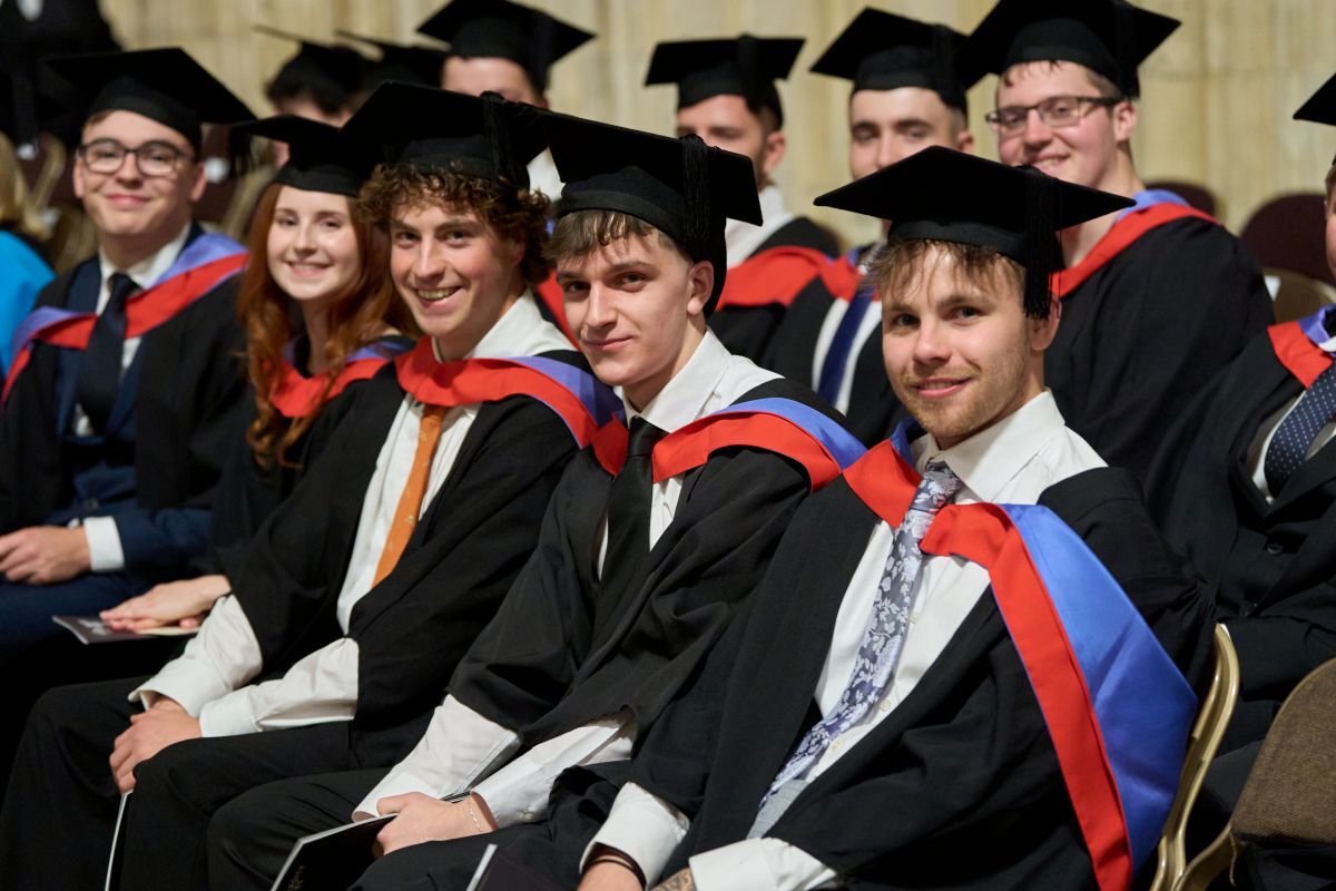 Jack Somerville with his fellow HNC for Engineering students sat in York Minster waiting to graduate