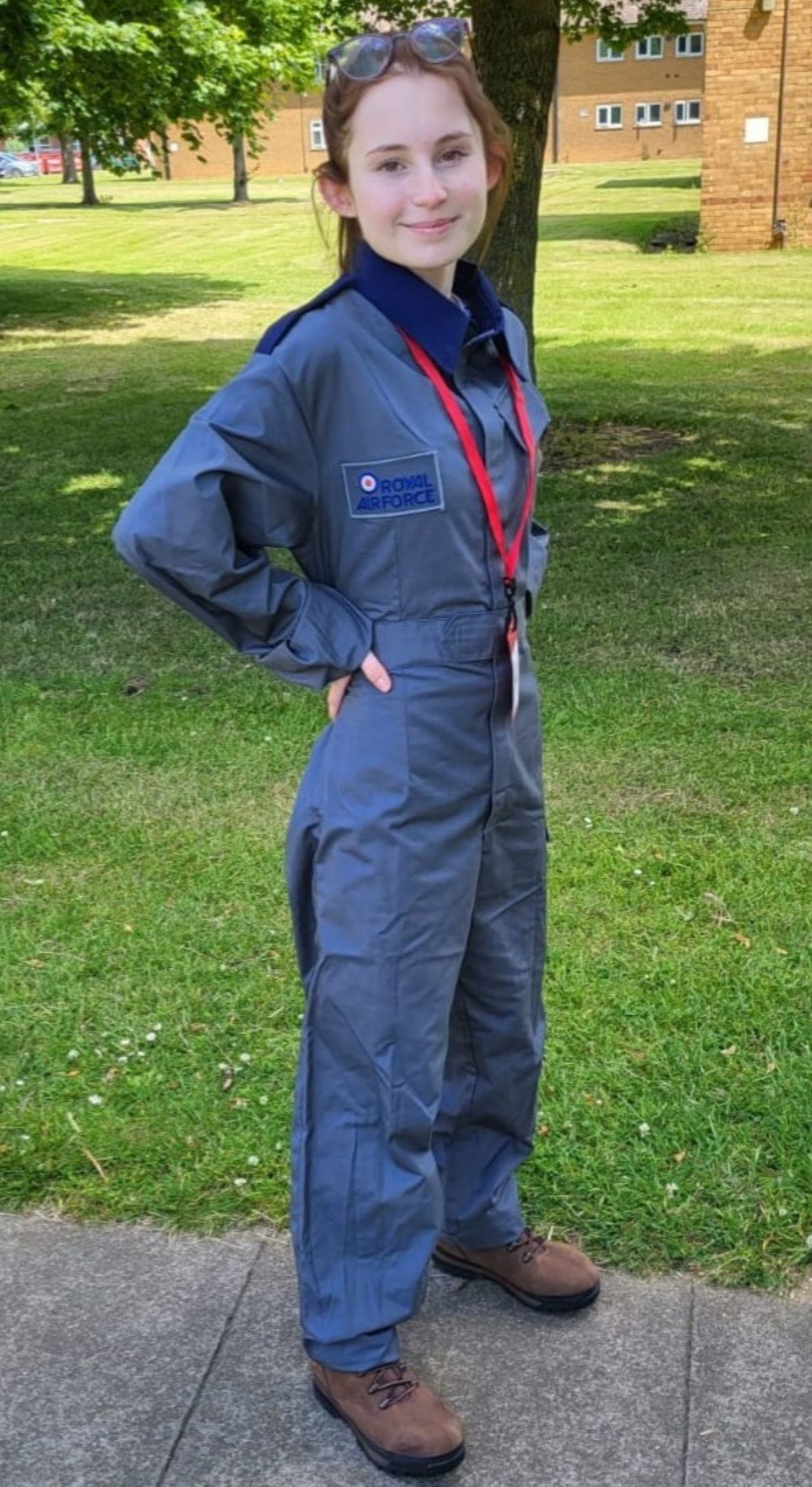 Robyn Bradley with hands on her hips in an RAF uniform