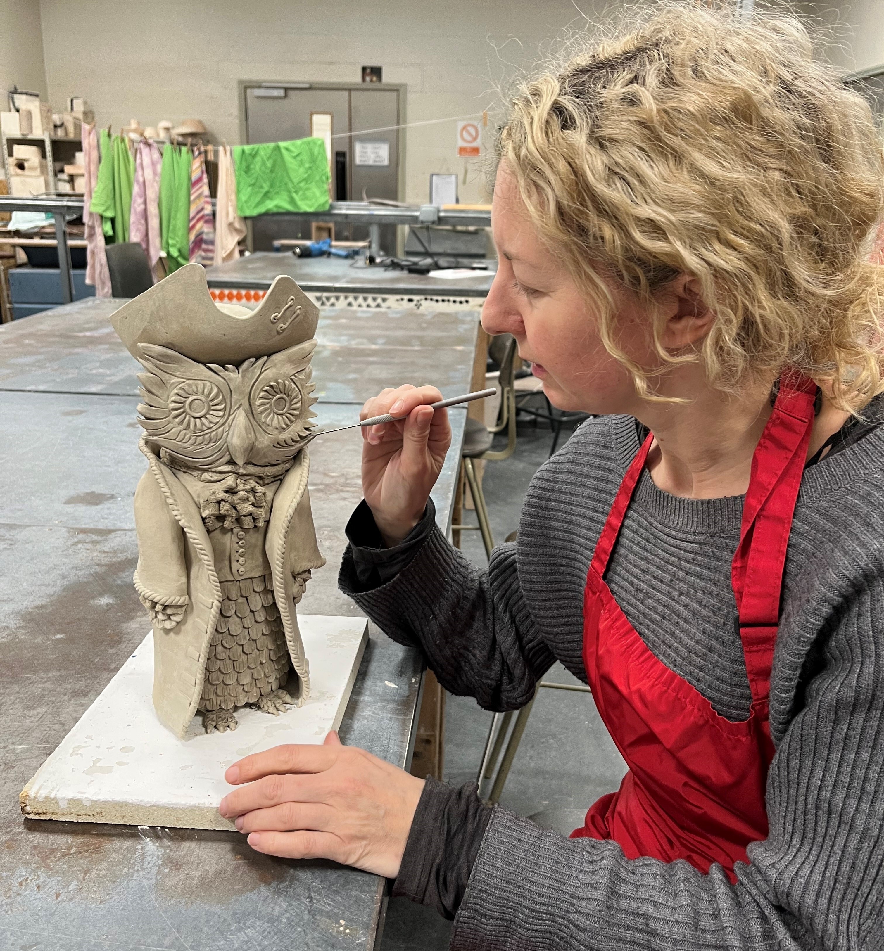 Sarah with Hooting Owl Sculpture