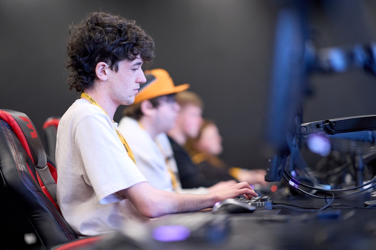 Students working at the computers in the Esports classroom