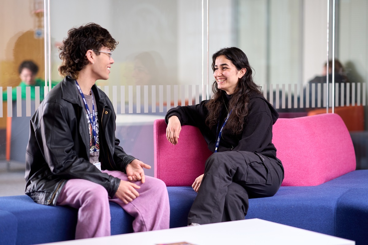 Two students chat in the Uni Centre Courses for Adults