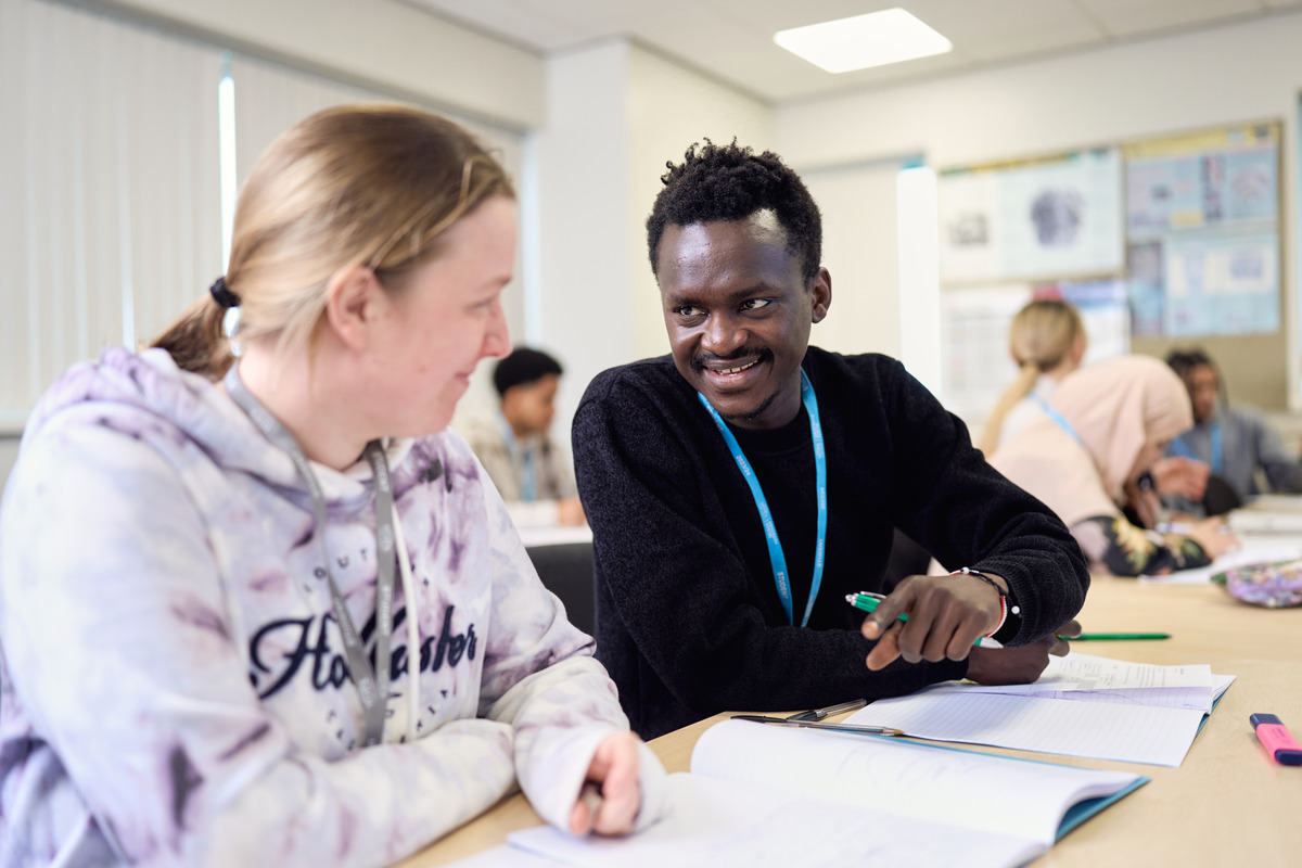 Two students write some notes GCSE English