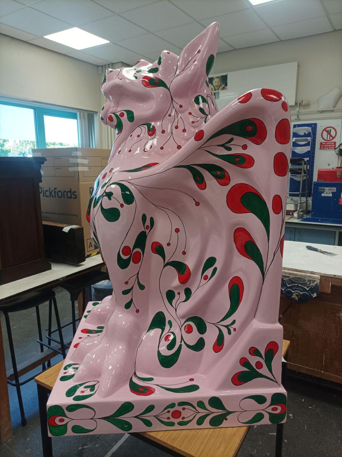 Varnished Watcher sculpture in College workshop left view