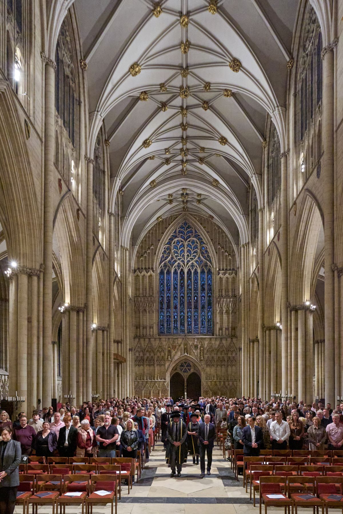 York College University Centre Principal Chief Executive Ken Merry and Guest Speaker Steve Mc Claren lead the procession down the middle aisle of York Minster