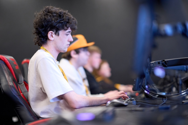 Students working at the computers in the Esports classroom