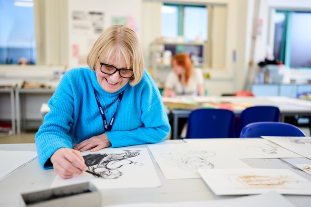 A student draws with charcoal Paintning Drawing