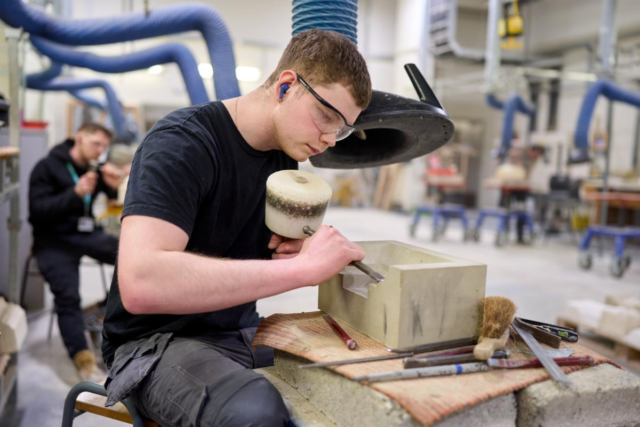 Stonemasonry student in workshop working