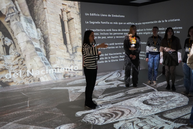 A Level Spanish students are having a lesson on Spanish architecture in the Immersive room