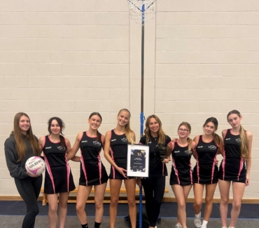 Netball team and Janine Gibbons best