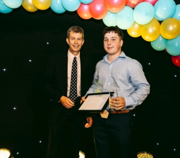Sam Welch is presented with the REACH Governors Award by York College Chair of Governors Ian Looker
