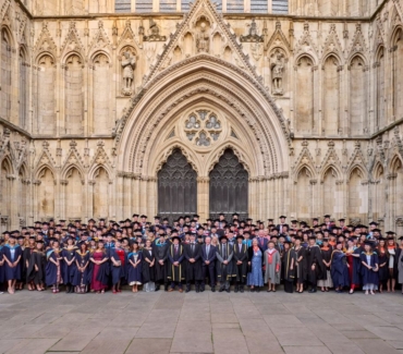 York College University Centre graduates outside York Minster with staff and VIP guests including former England football manager Steve Mc Claren