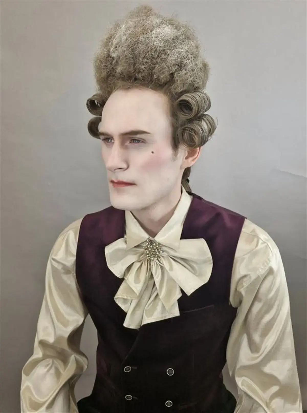 Male model showcasing Media make up wig make up project