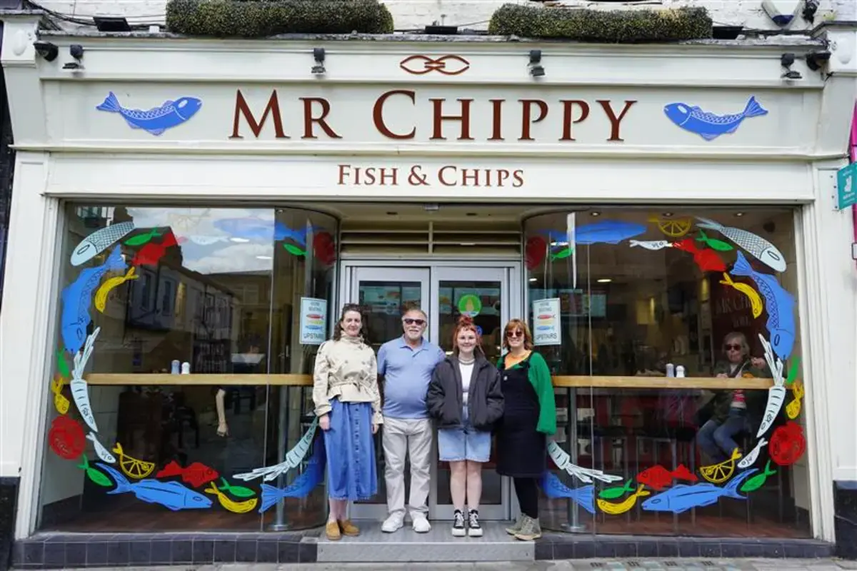 Student tutor mr chippy outside of rebranded shop front